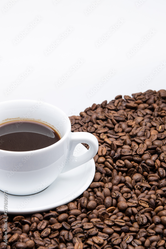 white cup of coffee with coffee bean on white background white cup of coffee with coffee bean on white background