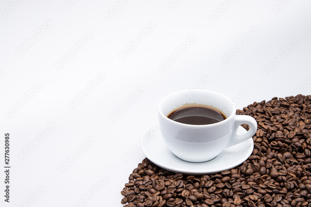 white cup of coffee with coffee bean on white background white cup of coffee with coffee bean on white background