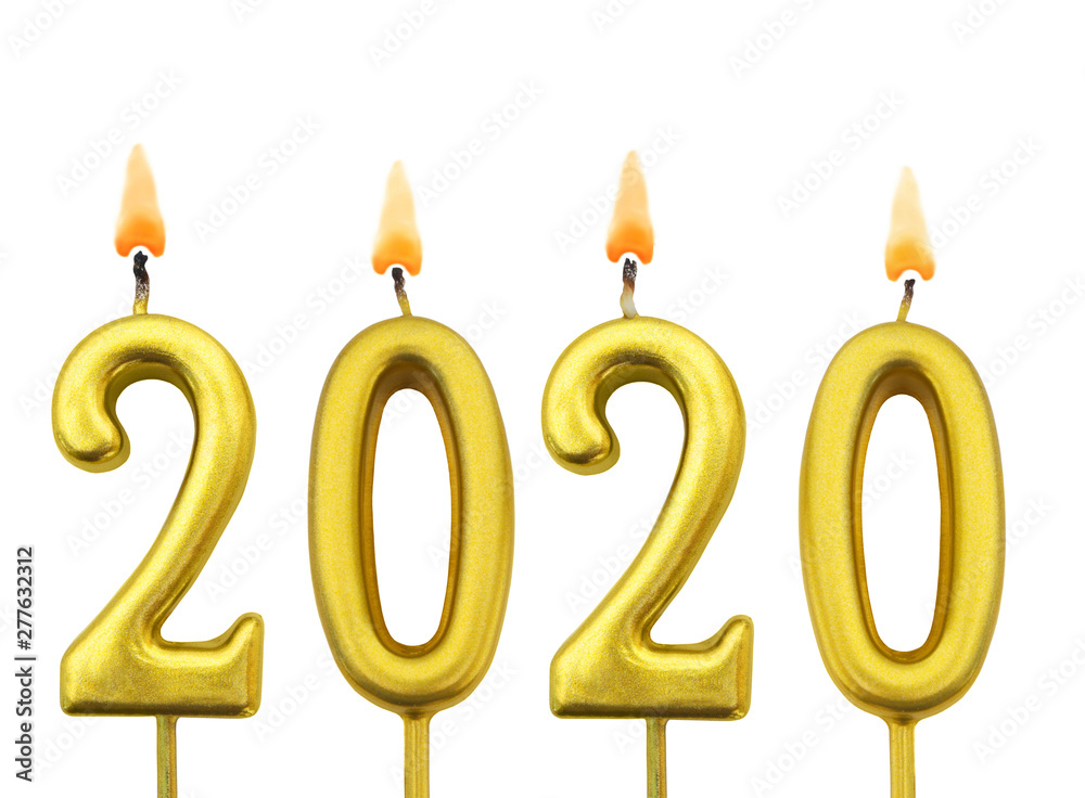Burning golden candles isolated on white background, number 2020, new year concept Burning golden candles isolated on white background, number 2020, new year concept
