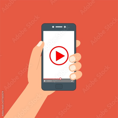 Hand holding phone icon. Vector illustration. There is a "play" button on the display of the smartphone in the picture