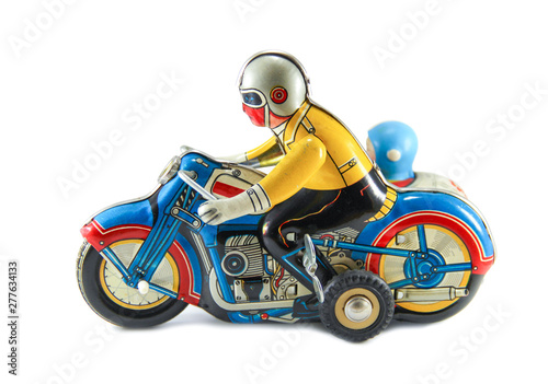 Motorcycle clockwork tin toy.