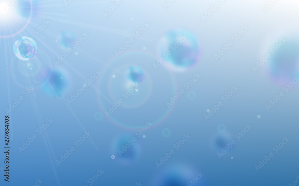 Soap bubbles blue defocused background