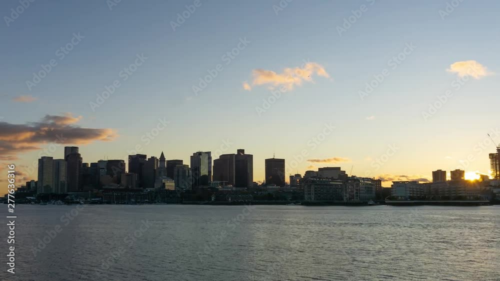 Timelapse of a Striking cityscape of a modern Downtown City during a vibrant sunset. Taken from LoPresti Park, Boston, Capital of Massachusetts, United States. Timelapse of a Striking cityscape of a modern Downtown City during a vibrant sunset. Taken from LoPresti Park, Boston, Capital of Massachusetts, United States.
