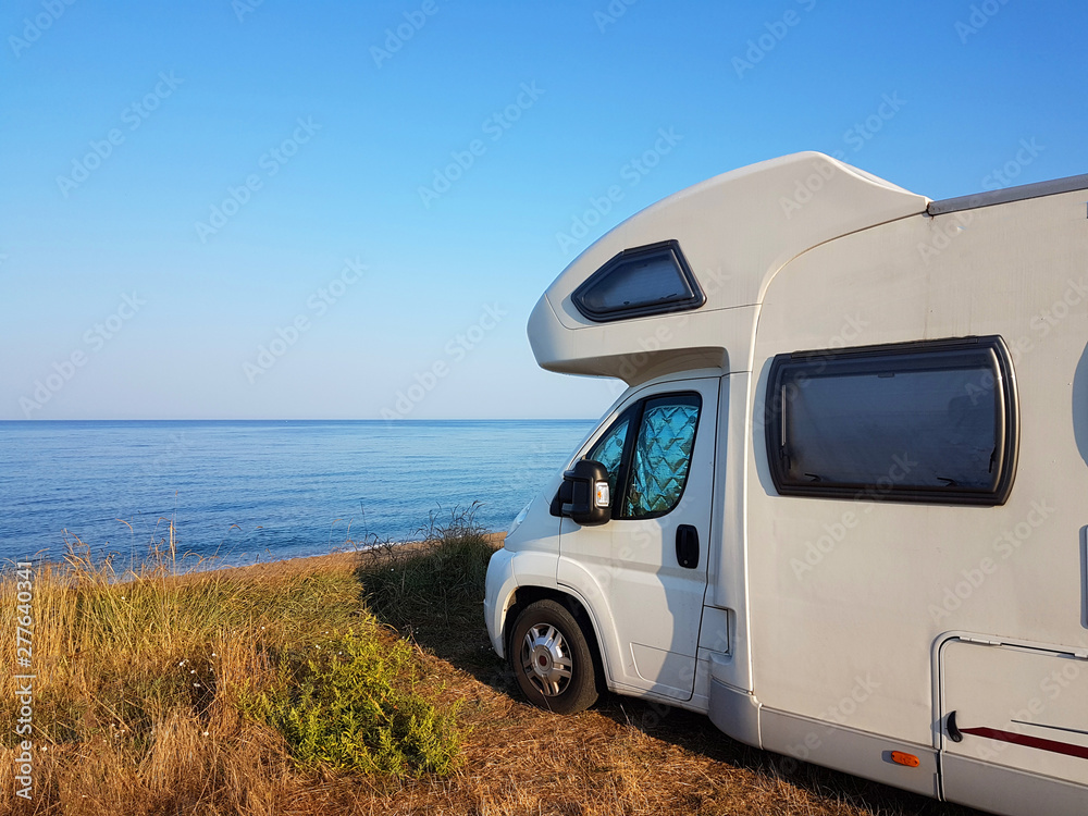 caravan car by the sea summer holidays - obrazy, fototapety, plakaty 