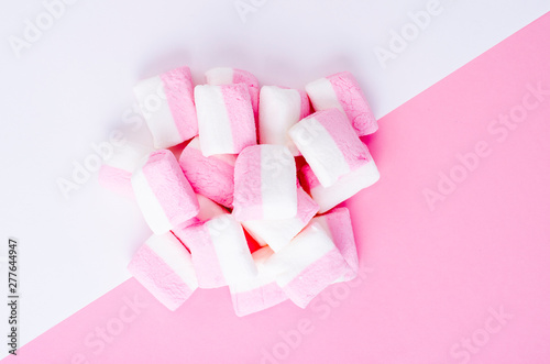 Colorful marshmallow on bright background. Fluffy marshmallows texture and pattern