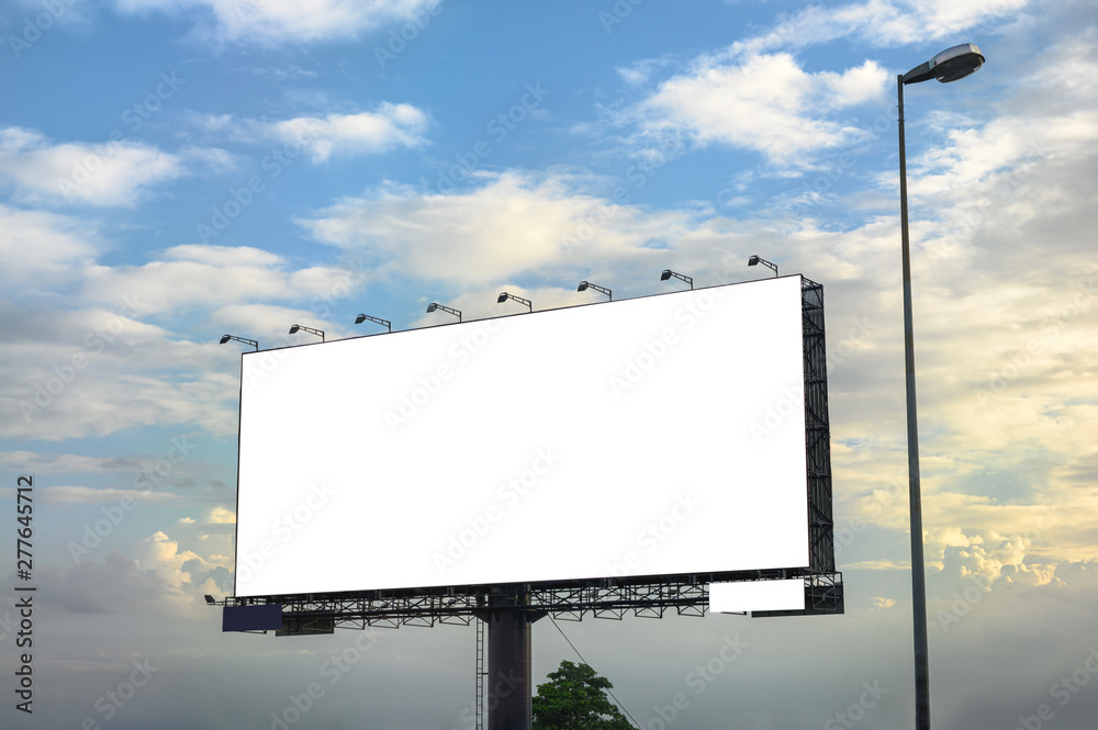White large empty billboard with steel structure on side of road White large empty billboard with steel structure on side of road