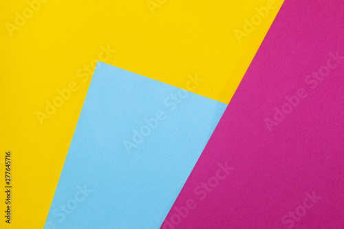Bright background with yellow, blue and pink colors.