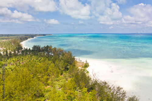 Large tropical island white sandy beach, view from above. Seascape, nature of the Philippine Islands. Tropical forest and sea lagoons.