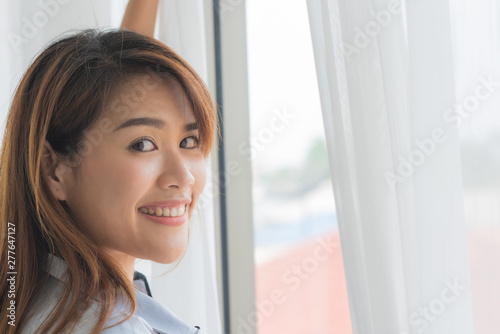 Young beauty woman standing in front of window in the morning, Portrait close up Free Download Young beauty woman standing in front of window in the morning, Portrait close up - GFXLoad