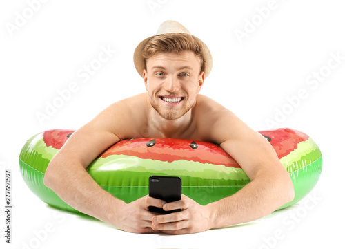 Young tourist with inflatab...
