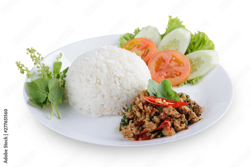 Authentic Thai fried chicken with basil with rice isolated on white background. Authentic Thai basil chicken recipe Authentic Thai fried chicken with basil with rice isolated on white background. Authentic Thai basil chicken recipe