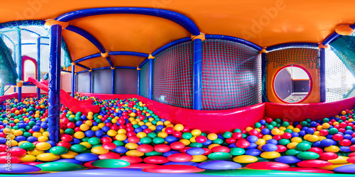 children's playroom with colorful balls and a slide made of plastic. Spherical panorama 360vr