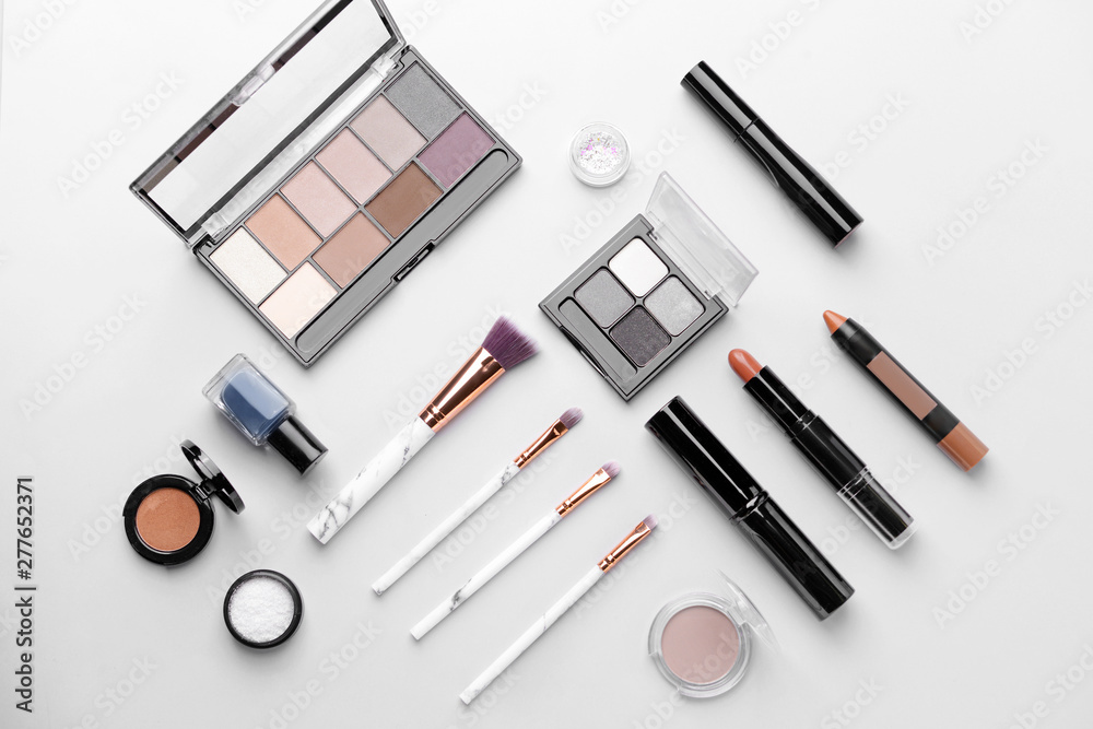Set of decorative cosmetics on light background Set of decorative cosmetics on light background
