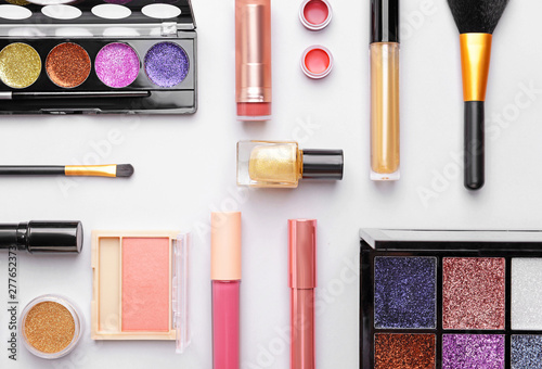 Set of decorative cosmetics on light background