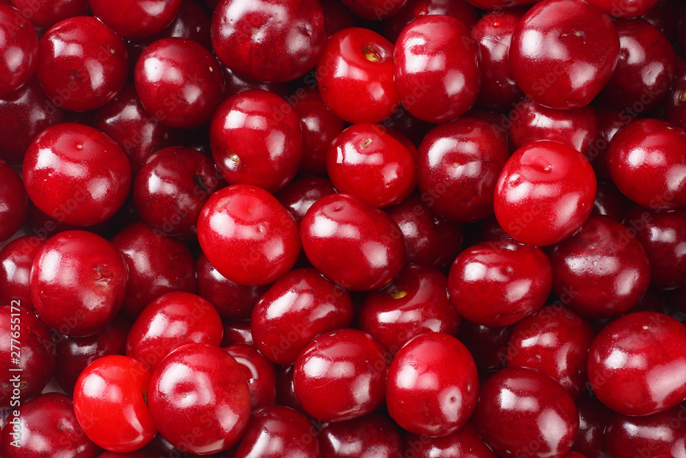 Red juicy cherries background. cherry texture. Top view. Red juicy cherries background. cherry texture. Top view.
