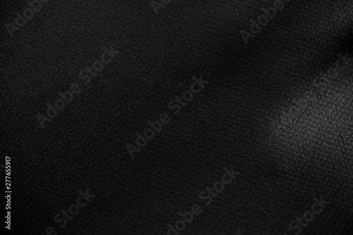 black wrinkled paper texture for you design background.
