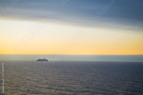 The ferry sails at dawn. Very beautiful sky.