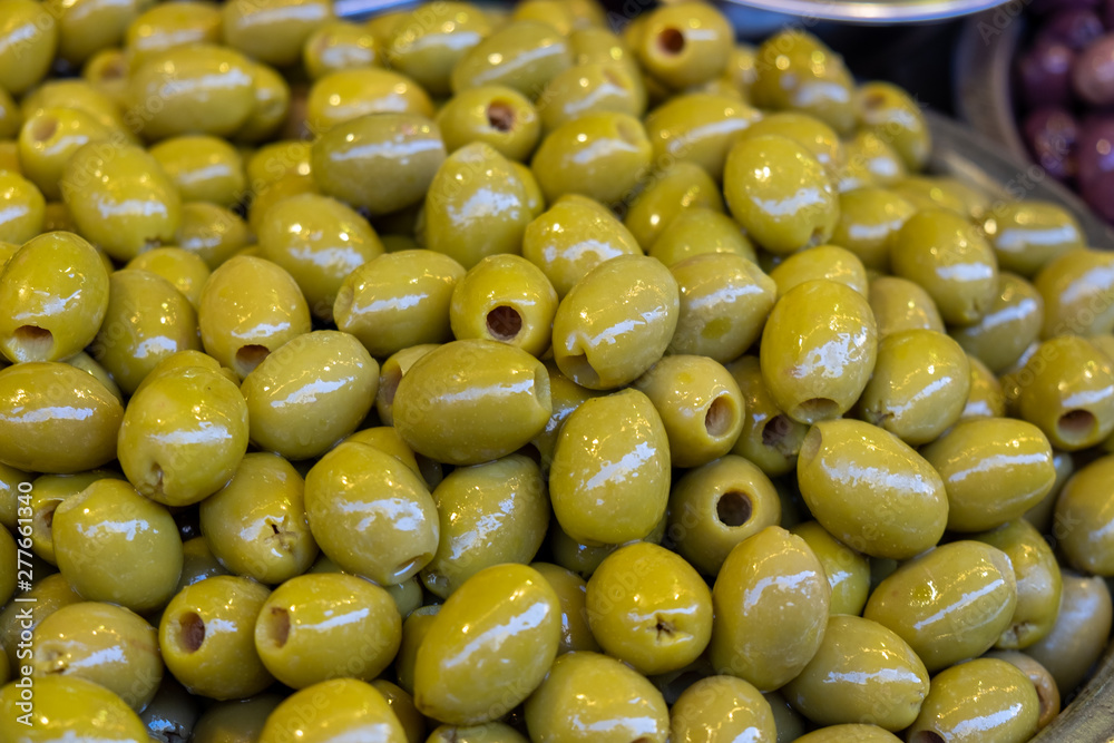 Marinated green olives sold on farmers market Marinated green olives sold on farmers market