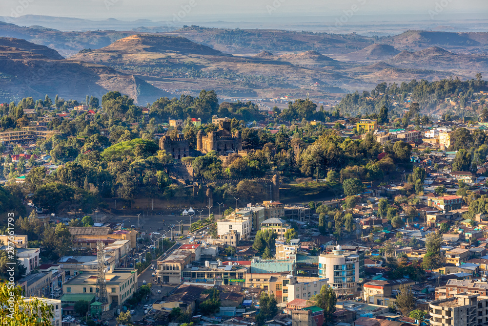 Panorama of city Gondar with Fasil Ghebbi, Royal fortress-city within Gondar, Ethiopia. Imperial palace castle complex is also called Camelot of Africa. UNESCO World Heritage Site.