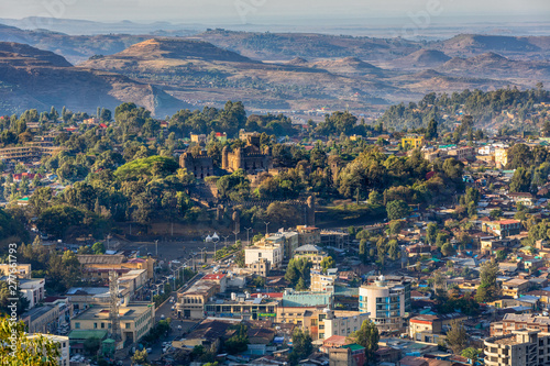 Fototapeta Naklejka Na Ścianę i Meble -  Panorama of city Gondar with Fasil Ghebbi, Royal fortress-city within Gondar, Ethiopia. Imperial palace castle complex is also called Camelot of Africa. UNESCO World Heritage Site.