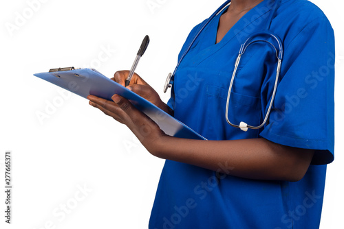 nurse or doctor woman writing on clipboard photo