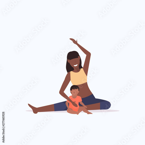 mother and kid doing physical exercises african american sportswoman engaged in fitness or yoga with baby son healthy lifestyle concept flat full length