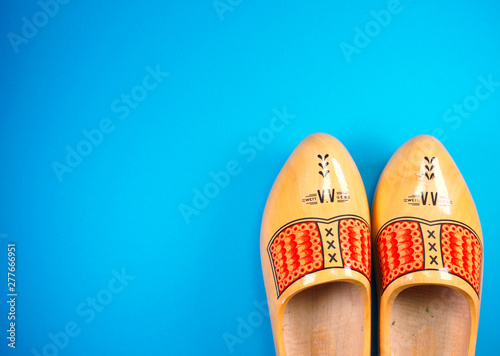 Holland, Netherlands, Amsterdam, Volendam, Marken, clogs at blue background with copy space for your own text