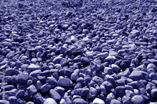 Pile of small gravel stones in blue tone.