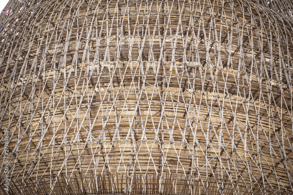 Fototapeta premium bamboo scaffolding around a temple