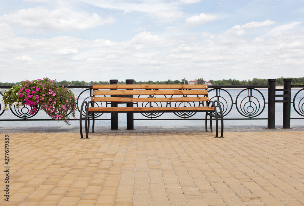 Bench in a quay.Summer vacation