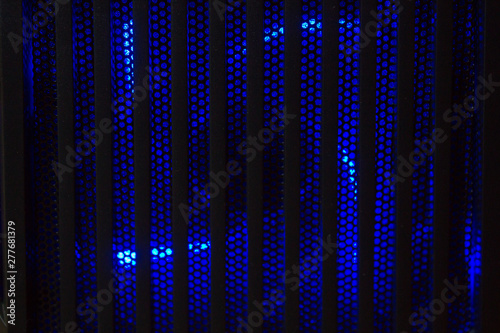 blue computer cooler Cooler of processor with neon light. LED Light  CPU Cooler. Computer circuit board and CPU cooling fans illuminated by internal LEDs inside a computer.