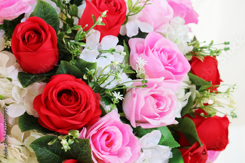 red and pink rose boutique flower decorate in wedding isolated