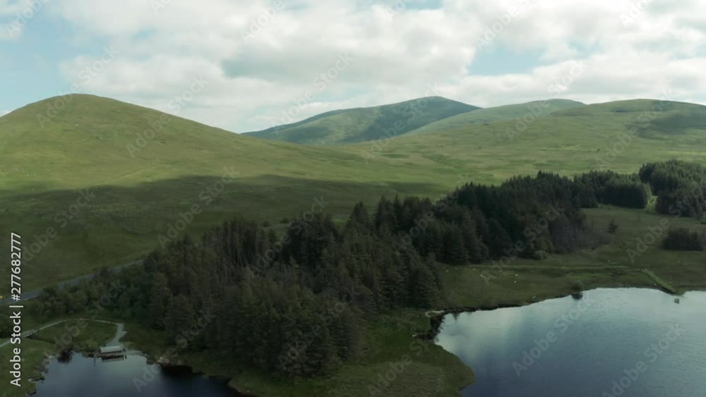 Aerial Flight Over summer mourne mountain area countryside Northern Ireland.Hiking And Tourism Concept Aerial Flight Over summer mourne mountain area countryside Northern Ireland.Hiking And Tourism Concept