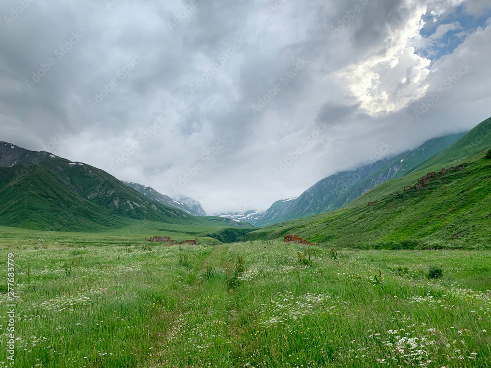 Russia, North Ossetia.  Mountains forming the Zrug gorge in cloudy weather