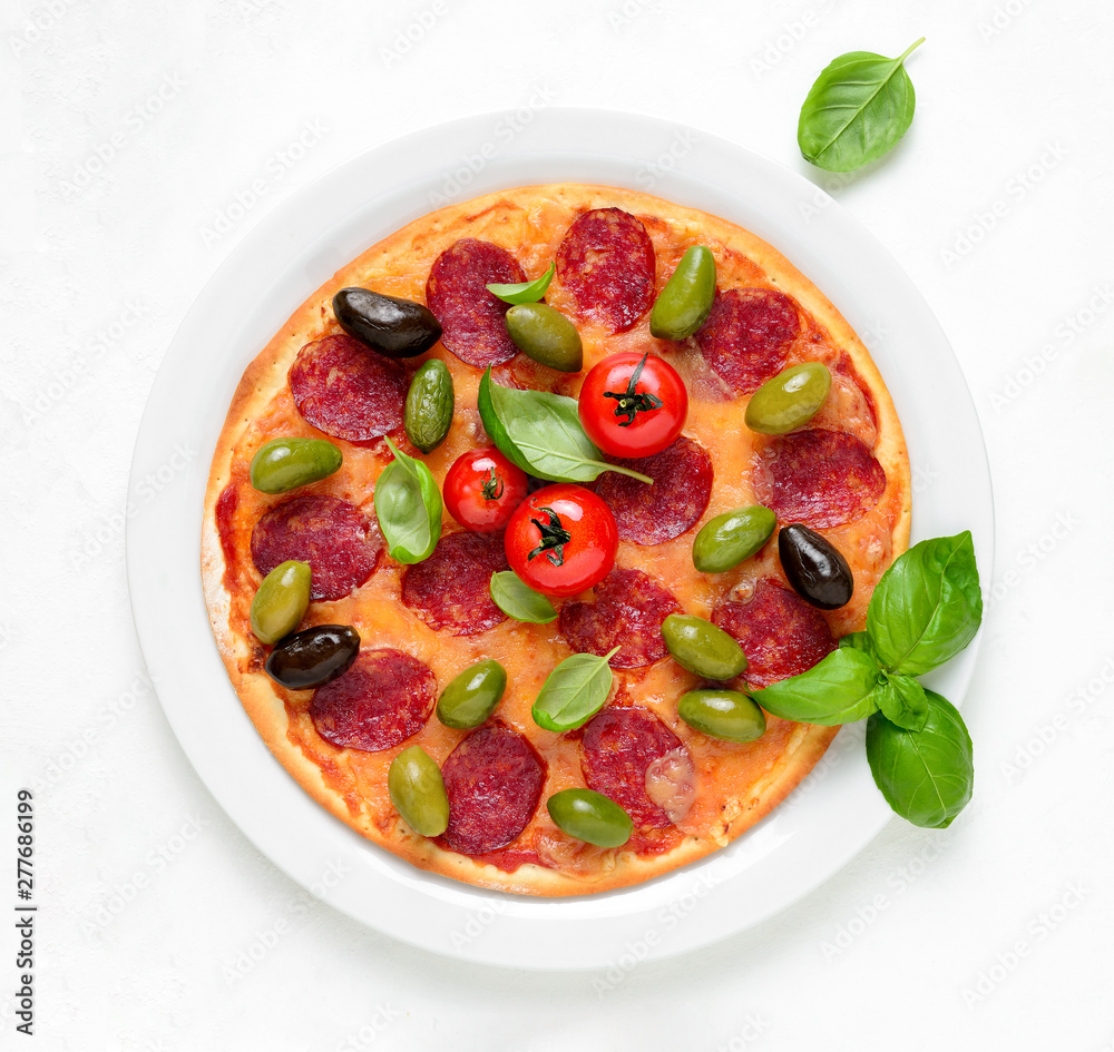 Pizza with salami and olives, top down view Pizza with salami and olives, top down view