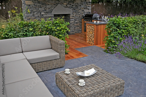 A lifestyle garden combining outdoor kitchen and indoor living in style and comfort