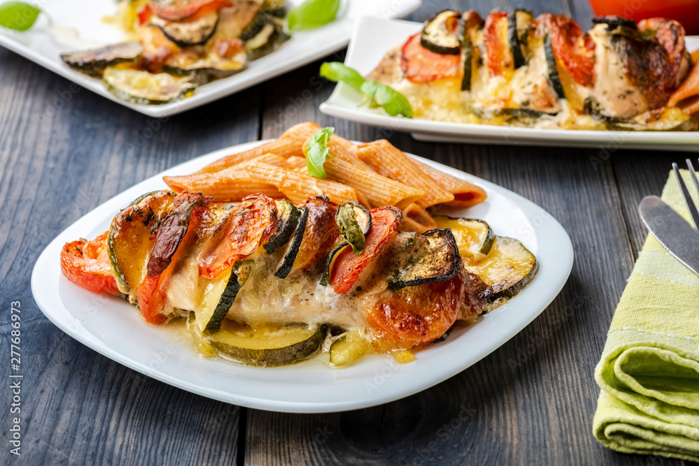 baked chicken breast with mozzarella and vegetables