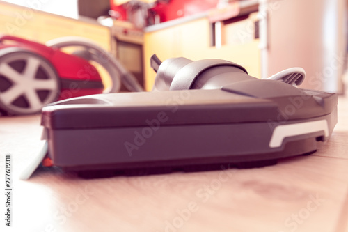 vacuum cleaner on a laminate in a kitchen