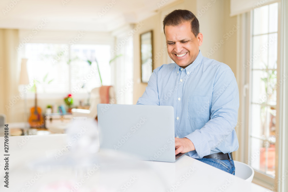 Middle age man using computer laptop Middle age man using computer laptop