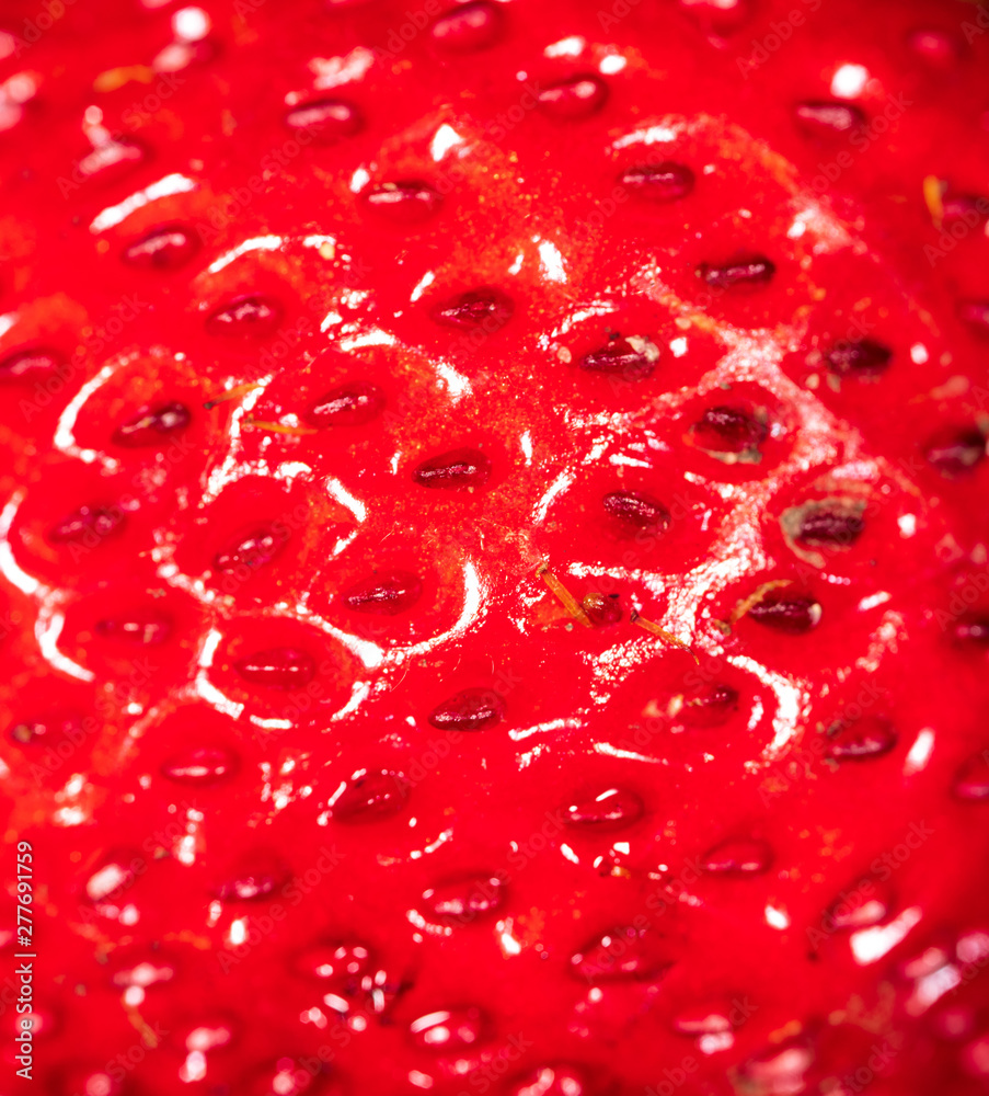 Red ripe strawberry as a background