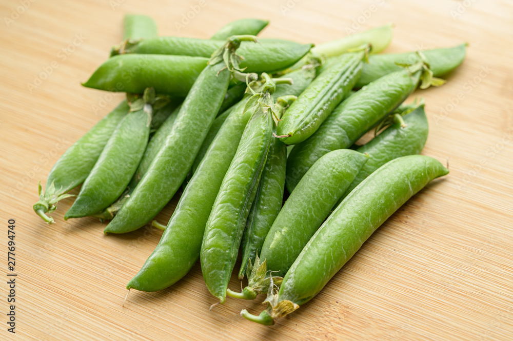 Natural looking fresh green pea. Macro with shallow depth of field. Natural looking fresh green pea. Macro with shallow depth of field.