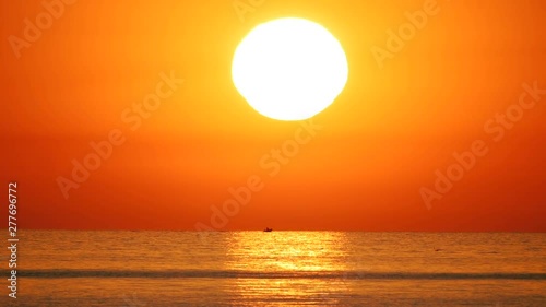 sunset over the sea photo