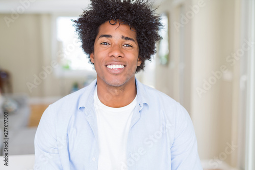 African American man at home with a happy and cool smile on face. Lucky person.