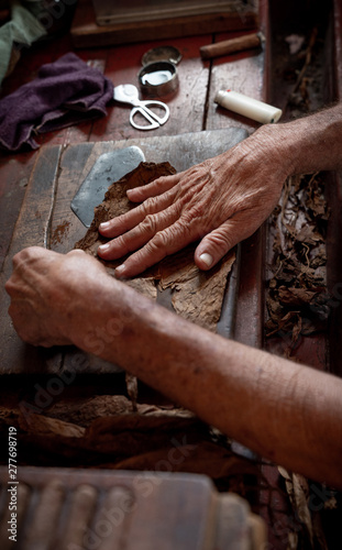 Cigar rolling or making by torcedor in cuba