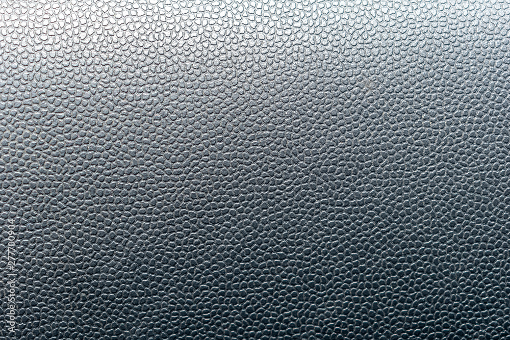Gradient black leather texture close up can be used as background Gradient black leather texture close up can be used as background
