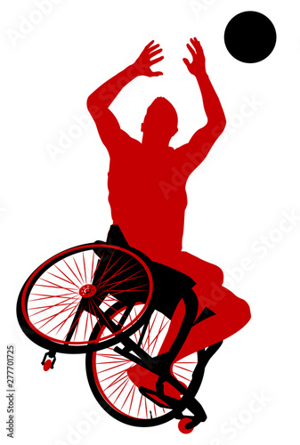 Person in a wheelchair playing basketball