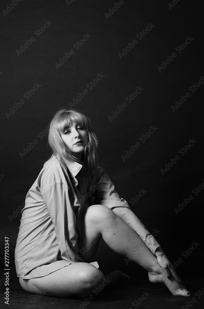 sexy beautiful young woman.passion girl in a man's shirt sexy beautiful young woman.passion girl in a man's shirt