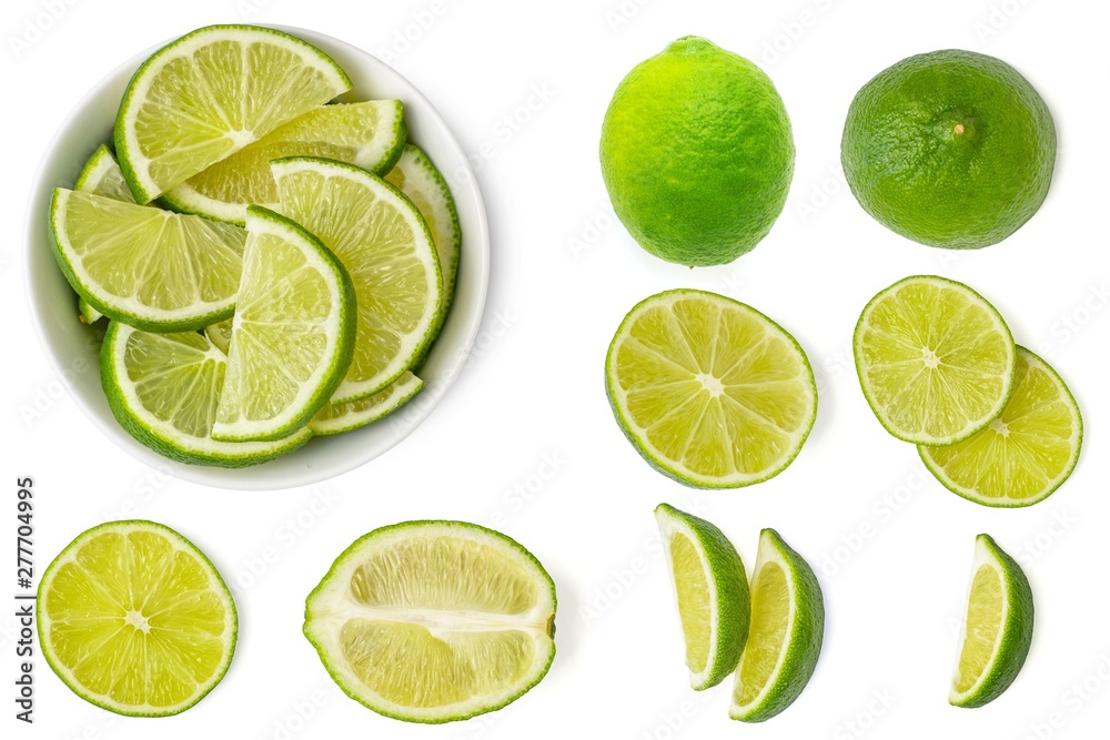 Set of fresh whole and slices lime. Isolated on white background. Top view