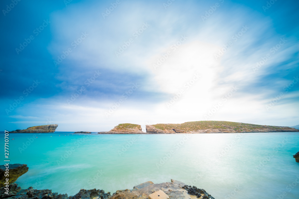Pure crystal turquoise water of Blue Lagoon in Comino Malta