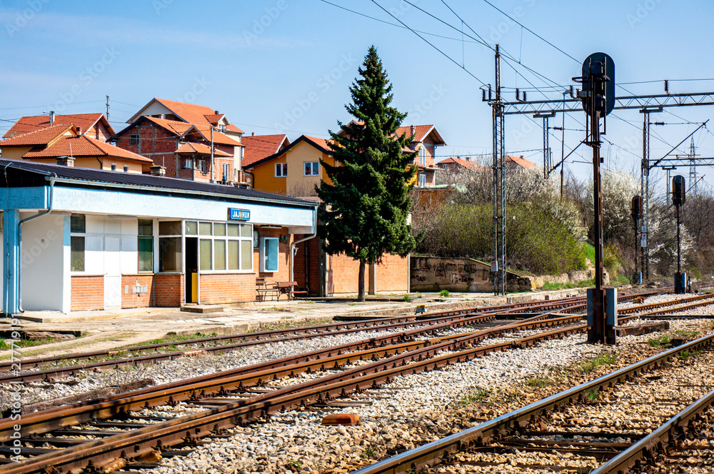 Fototapeta premium Train rails and train station